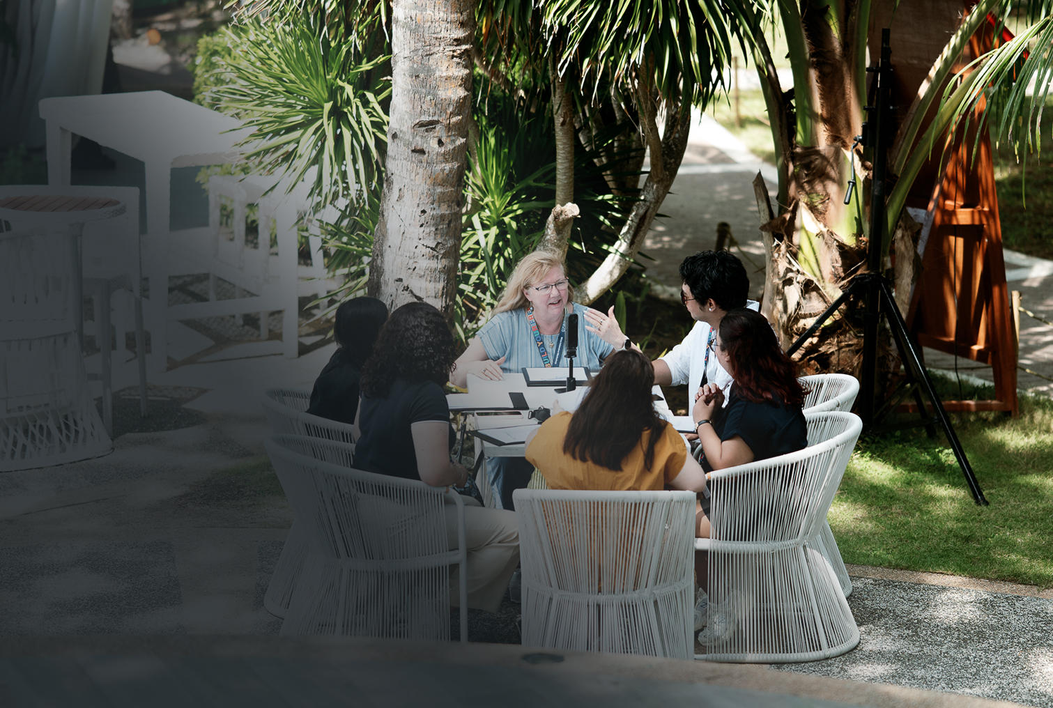 Outdoor breakout session under the palms
