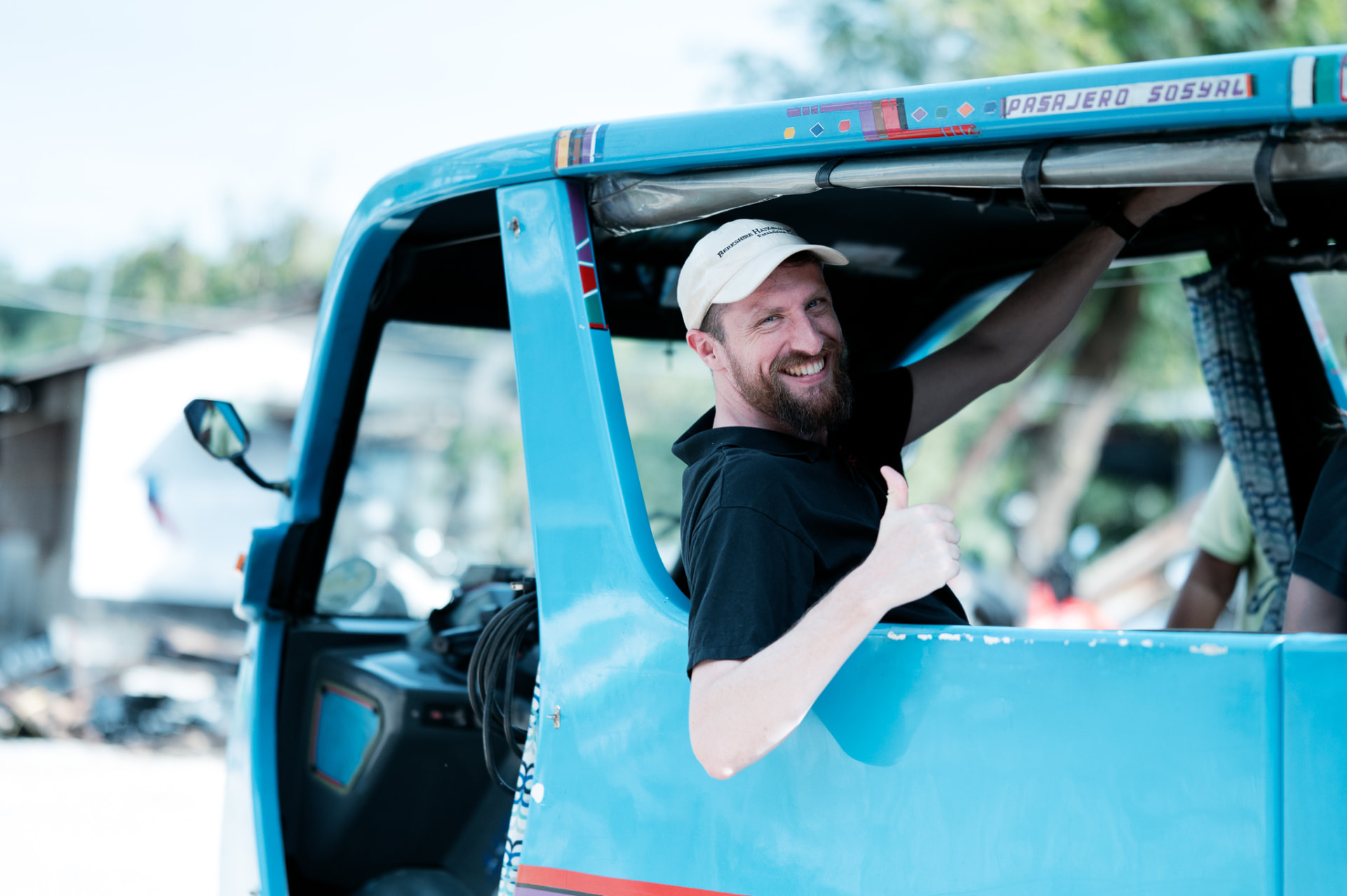 Wize member enjoying a jeepney ride in the Philippines